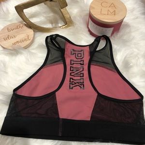 Pink top, gym clothes, sport bra.  Victoria’s Secr
